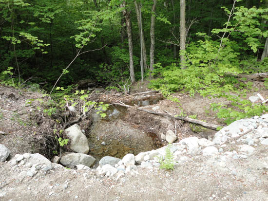 Sediment in brook crossed by Mittersill base access road, June 2011